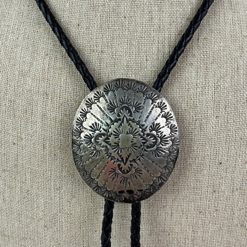 VTG Native American Harvey Bear Track Sterling Silver Black Leather Bolo Tie